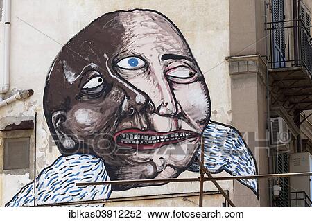 "Head with two faces, surreal mural in the historic centre, Palermo, Province of Palermo, Sicily, Italy, Europe" View Large Photo Image Stock Image - "Head with two faces, surreal mural in the historic centre, Palermo, Province of Palermo, Sicily, Italy, Europe". Fotosearch