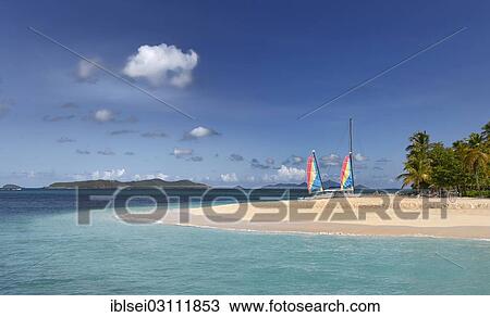 "Headland with sailing boats on the Caribbean Sea, Grenadines, Karibik, Saint Lucia, North America" View Large Photo Image Stock Image - "Headland with sailing boats on the Caribbean Sea, Grenadines, Karibik, Saint Lucia, North America". Fotosearch