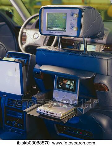 "Headrest in a BMW with a built-in monitor with internet access, a console with a DVD player and a monitor" View Large Photo Image Stock Image - "Headrest in a BMW with a built-in monitor with internet access, a console with a DVD player and a monitor". Fotosearch