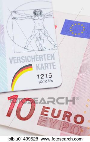 Stock Photo - Health insurance card from AOK health insurance and a 10 euro banknote for consultation fees. Fotosearch