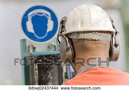 "Hearing protection sign, man wearing a helmet with noise protection on a galvanising line, Salzgitter AG Steel Mill, Salzgitter, Lower Saxony, Germany, Europe" View Large Photo Image Picture - "Hearing protection sign, man wearing a helmet with noise protection on a galvanising line, Salzgitter AG Steel Mill, Salzgitter, Lower Saxony, Germany, Europe". Fotosearch
