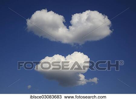 Heart-shaped clouds in the sky View Large Photo Image Stock Image - Heart-shaped clouds in the sky. Fotosearch