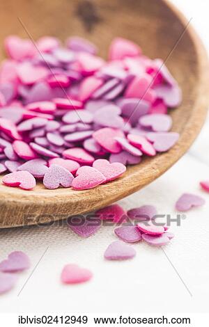 Heart-shaped pink and purple sprinkles View Large Photo Image Stock Photo - Heart-shaped pink and purple sprinkles. Fotosearch