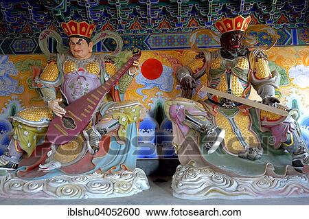 Stock Image - "Heavenly Kings, tutelary deities in Tianmen Temple, Buddhist centre of West Hunan, Hunan Province, China, Asia". Fotosearch
