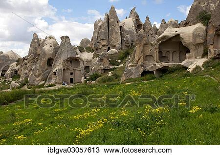 "Heavily eroded tuff cones with exposed storage spaces, Goreme National Park, near Goreme, Cappadocia, Nevsehir Province, Central Anatolia Region, Turkey, Asia" View Large Photo Image Stock Image - "Heavily eroded tuff cones with exposed storage spaces, Goreme National Park, near Goreme, Cappadocia, Nevsehir Province, Central Anatolia Region, Turkey, Asia". Fotosearch