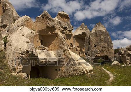"Heavily eroded tuff cones with the remains of storage spaces, Goreme National Park, near Goreme, Cappadocia, Nevsehir Province, Central Anatolia Region, Turkey, Asia" View Large Photo Image Stock Photo - "Heavily eroded tuff cones with the remains of storage spaces, Goreme National Park, near Goreme, Cappadocia, Nevsehir Province, Central Anatolia Region, Turkey, Asia". Fotosearch