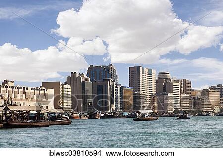 "Heavily laden traditional dhows on the Dubai Creek, Deira, Dubai, United Arab Emirates, Asia" View Large Photo Image Picture - "Heavily laden traditional dhows on the Dubai Creek, Deira, Dubai, United Arab Emirates, Asia". Fotosearch