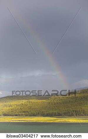 "Heavy clouds and rainbow over Marsh Lake, headwaters of the Yukon River, near Whitehorse, Yukon Territory, Canada, North America" View Large Photo Image Stock Photo - "Heavy clouds and rainbow over Marsh Lake, headwaters of the Yukon River, near Whitehorse, Yukon Territory, Canada, North America". Fotosearch