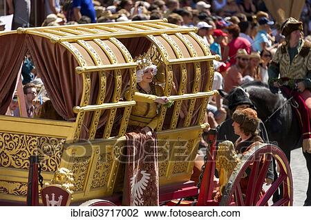 "Hedwig Jagiellonica, the bride in her golden bridal carriage, wedding procession of the """"Landshut Wedding"""", historic center, Landshut, Lower Bavaria, Bavaria, Germany, Europe" View Large Photo Image Stock Image - "Hedwig Jagiellonica, the bride in her golden bridal carriage, wedding procession of the """"Landshut Wedding"""", historic center, Landshut, Lower Bavaria, Bavaria, Germany, Europe". Fotosearch