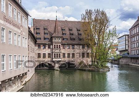 "Heilig-Geist-Spital building, Pegnitz river, Nuremberg, Middle Franconia, Germany, Europe" View Large Photo Image Stock Photograph - "Heilig-Geist-Spital building, Pegnitz river, Nuremberg, Middle Franconia, Germany, Europe". Fotosearch