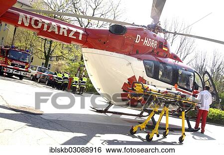 "Helicopter in operation with emergency medical and fire services in the city, Munich, Upper Bavaria, Bavaria, Germany, Europe" View Large Photo Image Stock Photograph - "Helicopter in operation with emergency medical and fire services in the city, Munich, Upper Bavaria, Bavaria, Germany, Europe". Fotosearch