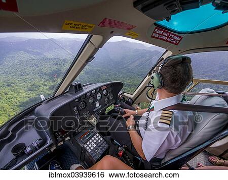 Stock Photograph - "Helicopter, interior view, in flight, Cresslands, Windward Islands, Lesser Antilles, Saint Lucia, North America". Fotosearch