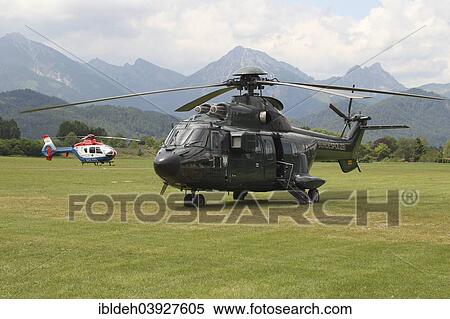 "Helicopter of the Federal Police, behind the Allgau Alps, near Fussen, Ostallgau, Allgau, Upper Swabia, Swabia, Bavaria, Germany, Europe" View Large Photo Image Stock Photography - "Helicopter of the Federal Police, behind the Allgau Alps, near Fussen, Ostallgau, Allgau, Upper Swabia, Swabia, Bavaria, Germany, Europe". Fotosearch