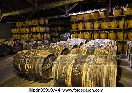 "Hennessy ageing warehouse where the eaux-de-vie is stored in oak barrels to mature before blending, Cognac, Poitou-Charente, France, Europe" View Large Photo Image Picture - "Hennessy ageing warehouse where the eaux-de-vie is stored in oak barrels to mature before blending, Cognac, Poitou-Charente, France, Europe". Fotosearch