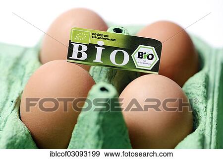 Stock Photo - "Hen's eggs with organic seal, symbolic image for mislabeled organic eggs, Germany, Europe". Fotosearch