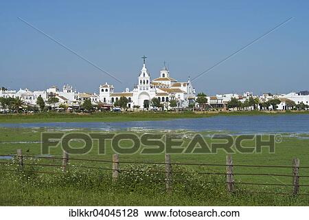 "Hermitage of El Rocio in the lagoon of the Donana National Park, El Rocio, Costa de la Luz, Andalusia, Spain, Europe" View Large Photo Image Stock Photo - "Hermitage of El Rocio in the lagoon of the Donana National Park, El Rocio, Costa de la Luz, Andalusia, Spain, Europe". Fotosearch