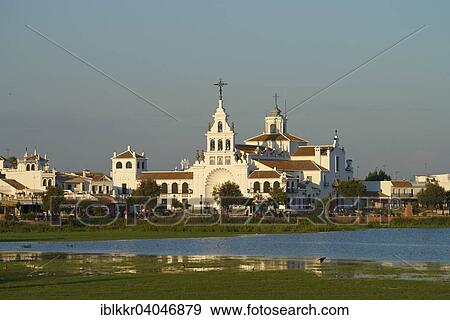 "Hermitage of El Rocio in the lagoon of the Donana National Park, El Rocio, Costa de la Luz, Andalusia, Spain, Europe" View Large Photo Image Stock Photo - "Hermitage of El Rocio in the lagoon of the Donana National Park, El Rocio, Costa de la Luz, Andalusia, Spain, Europe". Fotosearch