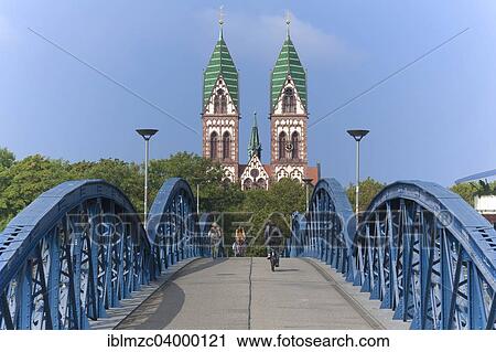 "Herz Jesu-Kirche, or Sacred Heart Church, built in the style of Historicism, consecrated in 1897, the Wiwilibrucke, or Blue Bridge, at front, Freiburg, Baden-Wurttemberg, Germany, Europe" View Large Photo Image Stock Image - "Herz Jesu-Kirche, or Sacred Heart Church, built in the style of Historicism, consecrated in 1897, the Wiwilibrucke, or Blue Bridge, at front, Freiburg, Baden-Wurttemberg, Germany, Europe". Fotosearch