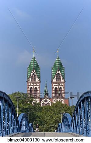 "Herz Jesu-Kirche, or Sacred Heart Church, built in the style of Historicism, consecrated in 1897, the Wiwilibrucke, or Blue Bridge, at front, Freiburg, Baden-Wurttemberg, Germany, Europe" View Large Photo Image Stock Image - "Herz Jesu-Kirche, or Sacred Heart Church, built in the style of Historicism, consecrated in 1897, the Wiwilibrucke, or Blue Bridge, at front, Freiburg, Baden-Wurttemberg, Germany, Europe". Fotosearch