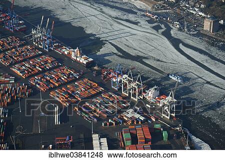 "HHLA Container Terminal Burchardkai in winter with ice on the Elbe, Hamburg, Germany, Europe" View Large Photo Image Stock Photo - "HHLA Container Terminal Burchardkai in winter with ice on the Elbe, Hamburg, Germany, Europe". Fotosearch