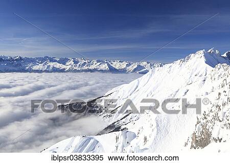 Stock Photography - "High fog over the Inn Valley, Innsbruck, Tyrol, Austria, Europe". Fotosearch