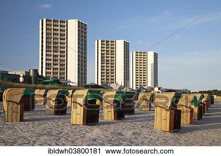 "High-rise buildings and wicker beach chairs on the south beach, Burgtiefe, Fehmarn, Schleswig-Holstein, Germany, Europe" View Large Photo Image Stock Image - "High-rise buildings and wicker beach chairs on the south beach, Burgtiefe, Fehmarn, Schleswig-Holstein, Germany, Europe". Fotosearch