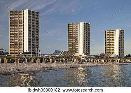 "High-rise buildings and wicker beach chairs on the south beach, Burgtiefe, Fehmarn, Schleswig-Holstein, Germany, Europe" View Large Photo Image Stock Image - "High-rise buildings and wicker beach chairs on the south beach, Burgtiefe, Fehmarn, Schleswig-Holstein, Germany, Europe". Fotosearch