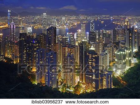 "High-rise buildings, residential houses and commercial buildings of Central, Hong Kong Island in front, Hong Kong and Kowloon River behind, at night, from Victoria Peak, Hong Kong, China, Asia" View Large Photo Image Stock Photo - "High-rise buildings, residential houses and commercial buildings of Central, Hong Kong Island in front, Hong Kong and Kowloon River behind, at night, from Victoria Peak, Hong Kong, China, Asia". Fotosearch