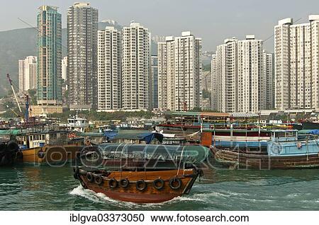 "High-rise buildings towering over Aberdeen Harbour, Sampan boat harbour, at Aberdeen Channel, Aberdeen, Hong Kong, China, Asia" View Large Photo Image Stock Image - "High-rise buildings towering over Aberdeen Harbour, Sampan boat harbour, at Aberdeen Channel, Aberdeen, Hong Kong, China, Asia". Fotosearch