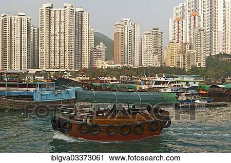 "High-rise buildings towering over Aberdeen Harbour, Sampan boat harbour, at Aberdeen Channel, Aberdeen, Hong Kong, China, Asia" View Large Photo Image Stock Image - "High-rise buildings towering over Aberdeen Harbour, Sampan boat harbour, at Aberdeen Channel, Aberdeen, Hong Kong, China, Asia". Fotosearch