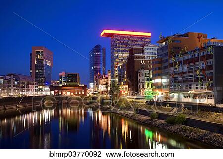 "High-rise office buildings at the Medienhafen, Media Harbour, Duesseldorf, North Rhine-Westphalia, Germany, Europe" View Large Photo Image Stock Image - "High-rise office buildings at the Medienhafen, Media Harbour, Duesseldorf, North Rhine-Westphalia, Germany, Europe". Fotosearch