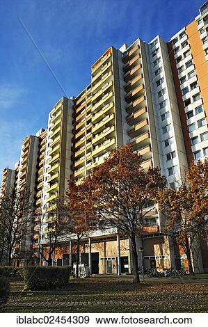 "High-rise residential apartment building from the seventies in the satellite city of Neuperlach, Munich, Bavaria, Germany, Europe" View Large Photo Image Stock Photo - "High-rise residential apartment building from the seventies in the satellite city of Neuperlach, Munich, Bavaria, Germany, Europe". Fotosearch