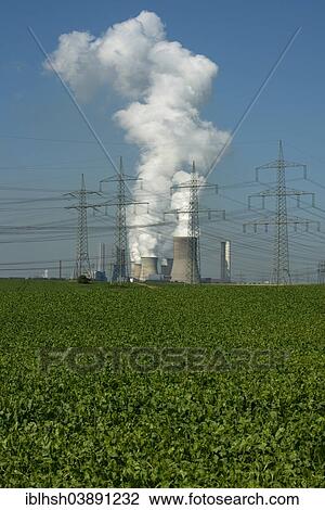 "High-voltage power lines in front of the lignite power plant of Bergheim-Niederaussem, arable land at the front, North Rhine-Westphalia, Germany, Europe" View Large Photo Image Stock Image - "High-voltage power lines in front of the lignite power plant of Bergheim-Niederaussem, arable land at the front, North Rhine-Westphalia, Germany, Europe". Fotosearch