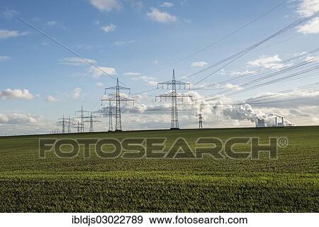 "High voltage transmission pylons, overhead power lines, Grevenbroich, Rhineland, North Rhine-Westphalia, Germany, Europe" View Large Photo Image Stock Photo - "High voltage transmission pylons, overhead power lines, Grevenbroich, Rhineland, North Rhine-Westphalia, Germany, Europe". Fotosearch