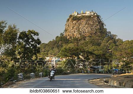 "Highway, Buddhist monastery, gilded Tuyin Taung Pagoda on the Taung Kalat volcanic cone, Mount Popa, Mandalay Region, Myanmar, Asia" View Large Photo Image Stock Image - "Highway, Buddhist monastery, gilded Tuyin Taung Pagoda on the Taung Kalat volcanic cone, Mount Popa, Mandalay Region, Myanmar, Asia". Fotosearch