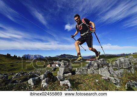 "Hiker at the Eggenalm mountain pasture, Reit im Winkl, Chiemgau, Upper Bavaria, Bavaria, Germany, Europe" View Large Photo Image Stock Photo - "Hiker at the Eggenalm mountain pasture, Reit im Winkl, Chiemgau, Upper Bavaria, Bavaria, Germany, Europe". Fotosearch
