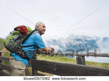 "Hiker at the Gundhuette alpine cabine, Neunerkopfle, Tannheim Valley, Tyrol, Austria, Europe" View Large Photo Image Stock Image - "Hiker at the Gundhuette alpine cabine, Neunerkopfle, Tannheim Valley, Tyrol, Austria, Europe". Fotosearch