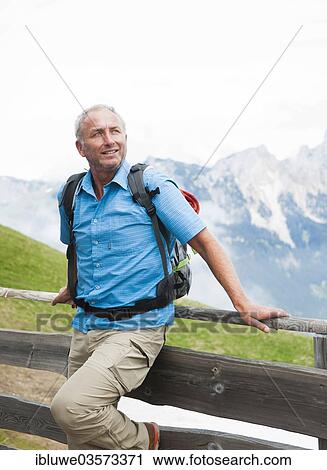 "Hiker at the Gundhuette alpine cabine, Neunerkopfle, Tannheim Valley, Tyrol, Austria, Europe" View Large Photo Image Stock Image - "Hiker at the Gundhuette alpine cabine, Neunerkopfle, Tannheim Valley, Tyrol, Austria, Europe". Fotosearch