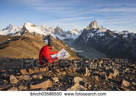 "Hiker at the Loma del Pliegue Tumbado, views of Cerro Torre and the Fitz Roy massif, Los Glaciares National Park, El Chalten, Santa Cruz, Argentina, South America" View Large Photo Image Stock Image - "Hiker at the Loma del Pliegue Tumbado, views of Cerro Torre and the Fitz Roy massif, Los Glaciares National Park, El Chalten, Santa Cruz, Argentina, South America". Fotosearch