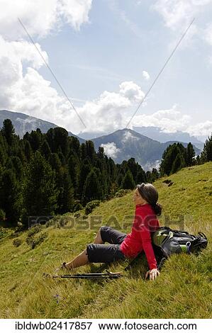 Hiker at the Raschotz or Rasciesa mountain pasture, near St. Ulrich, Val Gardena valley, Southern Tyrol, Alto Adige, Italy, Europe View Large Photo Image Stock Photo - Hiker at the Raschotz or Rasciesa mountain pasture, near St. Ulrich, Val Gardena valley, Southern Tyrol, Alto Adige, Italy, Europe. Fotosearch