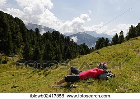 Hiker at the Raschotz or Rasciesa mountain pasture, near St. Ulrich, Val Gardena valley, Southern Tyrol, Alto Adige, Italy, Europe View Large Photo Image Stock Photo - Hiker at the Raschotz or Rasciesa mountain pasture, near St. Ulrich, Val Gardena valley, Southern Tyrol, Alto Adige, Italy, Europe. Fotosearch
