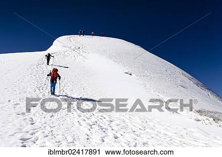 Hiker climbing Monte Cevedale mountain, the summit at the back, province of Bolzano-Bozen, Italy, Europe View Large Photo Image Stock Image - Hiker climbing Monte Cevedale mountain, the summit at the back, province of Bolzano-Bozen, Italy, Europe. Fotosearch