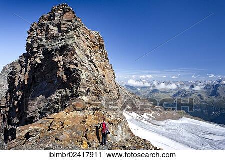 Hiker climbing Schneebiger Nock mountain, province of Bolzano-Bozen, Italy, Europe View Large Photo Image Stock Image - Hiker climbing Schneebiger Nock mountain, province of Bolzano-Bozen, Italy, Europe. Fotosearch