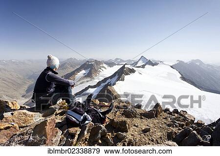 "Hiker on th summit of Similaun Mountain on the Niederioech Ferner in Val Senales above the Fernagt Reservoir, Marzell Spitz Mountain and Hintere Schwaerze Mountain at the rear, Alto Adige, Italy, Europe" View Large Photo Image Stock Photo - "Hiker on th summit of Similaun Mountain on the Niederioech Ferner in Val Senales above the Fernagt Reservoir, Marzell Spitz Mountain and Hintere Schwaerze Mountain at the rear, Alto Adige, Italy, Europe". Fotosearch