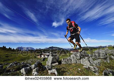 "Hiker on the Eggenalm mountain pasture, Reit im Winkl, Chiemgau, Upper Bavaria, Bavaria, Germany, Europe" View Large Photo Image Stock Photo - "Hiker on the Eggenalm mountain pasture, Reit im Winkl, Chiemgau, Upper Bavaria, Bavaria, Germany, Europe". Fotosearch