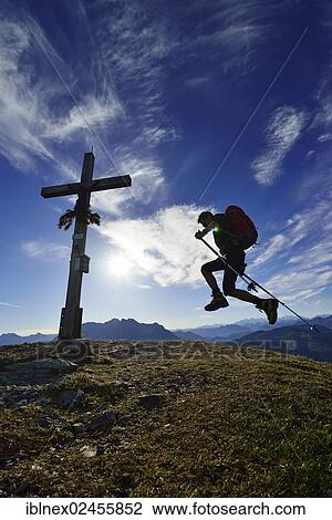 "Hiker on the summit of Mount Fellhorn, Reit im Winkl, Chiemgau region, Upper Bavaria, Bavaria, Germany, Europe" View Large Photo Image Stock Image - "Hiker on the summit of Mount Fellhorn, Reit im Winkl, Chiemgau region, Upper Bavaria, Bavaria, Germany, Europe". Fotosearch