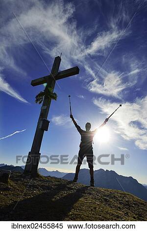 "Hiker on the summit of Mount Fellhorn, Reit im Winkl, Chiemgau region, Upper Bavaria, Bavaria, Germany, Europe" View Large Photo Image Stock Photography - "Hiker on the summit of Mount Fellhorn, Reit im Winkl, Chiemgau region, Upper Bavaria, Bavaria, Germany, Europe". Fotosearch