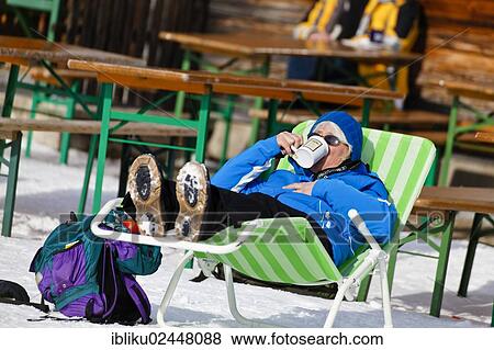 "Hiker resting, drinking a mulled wine in the Hirschkaser mountain restaurant, ski region of Schwarzeck near Ramsau, Berchtesgadener Land, Bavaria, Germany, Europe" View Large Photo Image Stock Photo - "Hiker resting, drinking a mulled wine in the Hirschkaser mountain restaurant, ski region of Schwarzeck near Ramsau, Berchtesgadener Land, Bavaria, Germany, Europe". Fotosearch