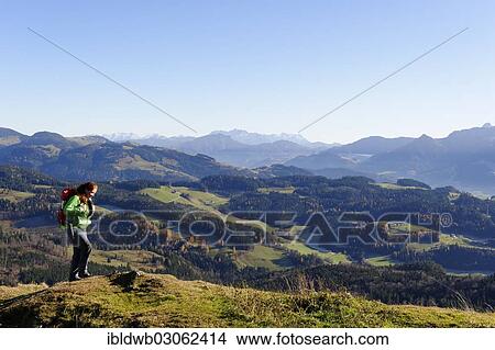 "Hiker with views from Kranzhorn mountain towards the Loferer Steinberge mountains and Zahmer Kaiser mountain, Inntal, Kranzhorn, Tyrol, Austria, Europe" View Large Photo Image Picture - "Hiker with views from Kranzhorn mountain towards the Loferer Steinberge mountains and Zahmer Kaiser mountain, Inntal, Kranzhorn, Tyrol, Austria, Europe". Fotosearch
