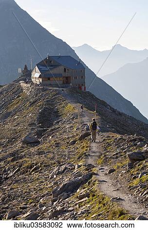 "Hikers at the Cabane de Pannossiere refuge, Val de Bagnes valley, Canton of Valais, Switzerland, Europe" View Large Photo Image Stock Image - "Hikers at the Cabane de Pannossiere refuge, Val de Bagnes valley, Canton of Valais, Switzerland, Europe". Fotosearch